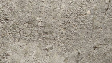Sertleştirilmiş çimento ile içine kum karıştırılmış arka plan dokusu yüzeyde yükselir..