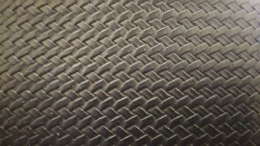 Örülmüş sentetik deri dokusu, siyah cüzdan. Yakın plan..