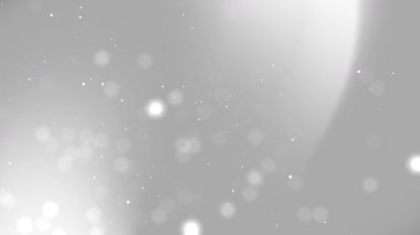 Yüzen parçacıklara sahip soyut beyaz arkaplan, yumuşak parıldayan hareket, zarif görseller, sunumlar ve dijital tasarımlar için mükemmel