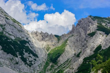 Mountains in the foreground, beautiful clouds in the background - Slovenia, Triglav National Park