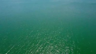 Göl ufkunun cazibesi: Gündoğumu ve günbatımı resimleri