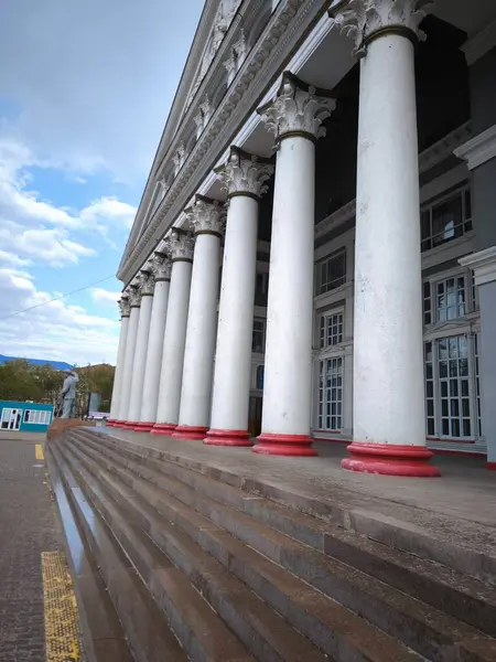 Balkhash, Kazakhstan - August 17, 2025: The buildings majestic facade features a neoclassical cliff and wide steps