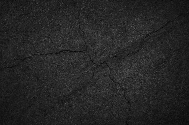 Sert asfalt üst görünümünün arkaplan dokusunu kır.
