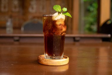 iced coffee with milk and ice cubes