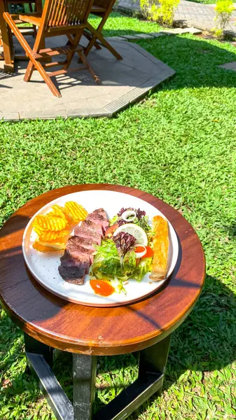 steak on wooden table