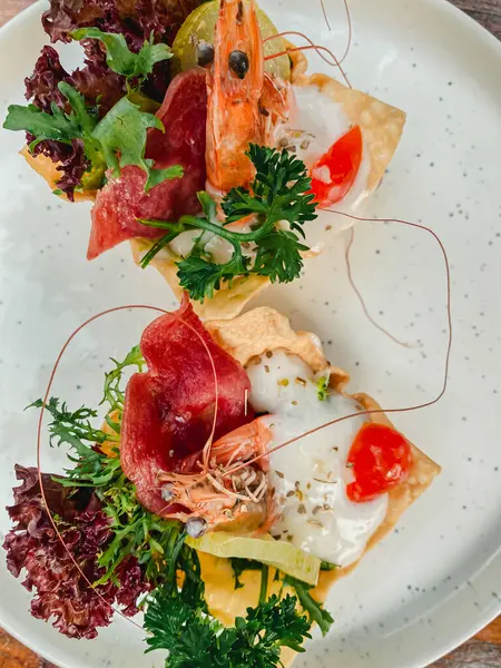 delicious seafood salad on white plate