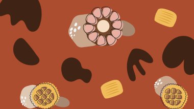 Parlak sarı desenli çikolata parçalı kurabiyeler ve renkli tatlı temalı şekerlerle süslenmiş kırmızı ve kahverengi soyut şekerler..