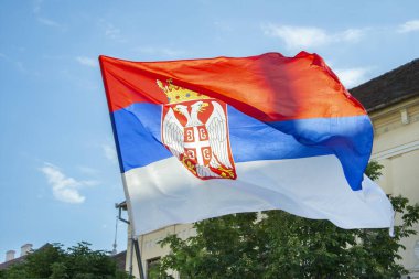 National flag of Serbia waving