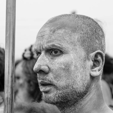 14 January, 2025, Prayagraj, uttar Pradesh, India. A Naga Sadhu, with a strange, distant look after the holy dip, lost in deep contemplation, embodying the mysticism and transformation of his spiritual journey. clipart