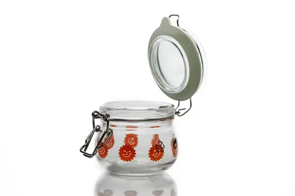 Canlı çiçek desenli cam kavanoz, şeker depolamak ya da mutfak dekoruna cazibe katmak için mükemmel..