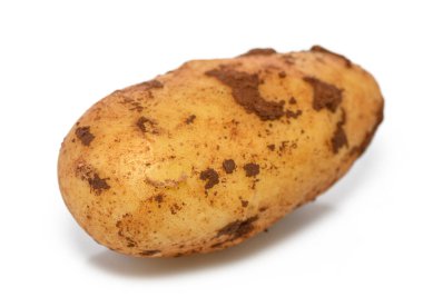 Kırsal bir patates, doğal toprak renklerini ve dokularını göstererek, organik basitliği vurgulayarak zarifçe oturur..