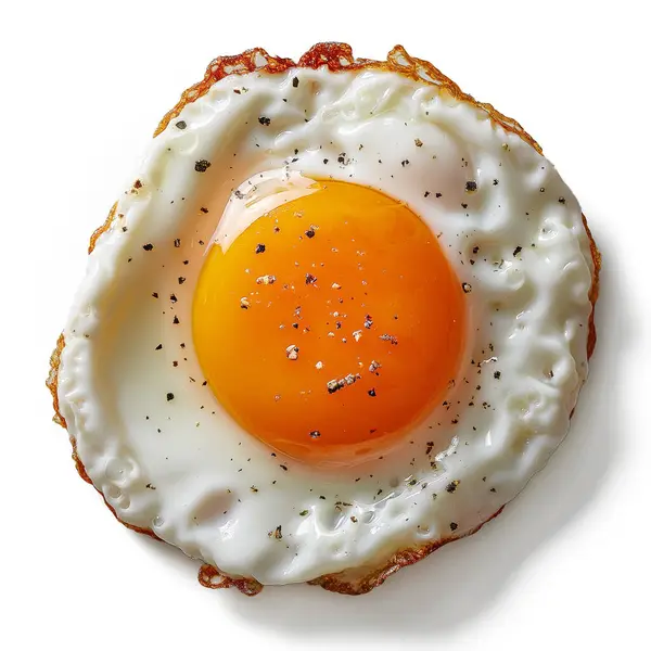 Altın sarısı ve çıtır çıtır kenarlı güzel pişmiş yumurta, nefis bir lezzeti davet ederek ışığı yakalar..