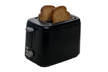 Samimi bir sabah rutini sırasında, parlak siyah bir tost makinesinden tam tahıllı ekmeğin altın dilimleri çıkar..