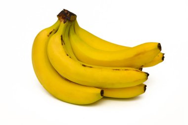 Parlak sarı muzlar birlikte dinlenir, çekici renklerini ve olgun dokusunu sağlık meraklıları için sergilerler..