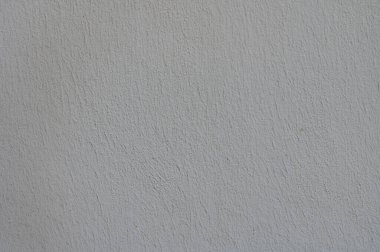 Pürüzsüz, hafif desenli bir duvar, yaratıcılık ve tasarım için davetkar bir atmosfer sunan çeşitli sanatsal çabalar için mükemmel bir tuval görevi görüyor..