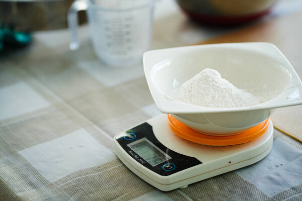 sugar powder in a white bowl