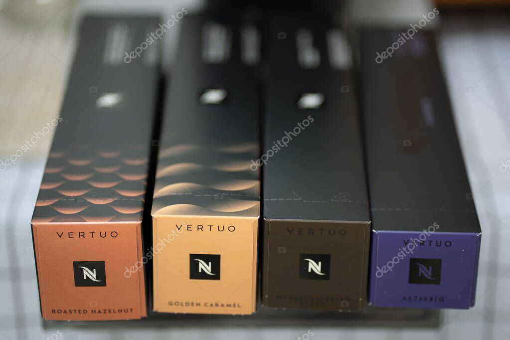 Pathum Thani, Thailand :17 April 2025.Boxes of nespresso on table. Nespresso coffee capsules is a type of pre-apportioned single-use container of ground coffee beans, sometimes with added flavoring.