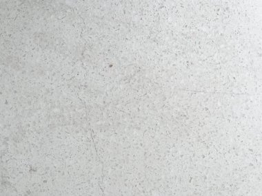 Beyaz ışıklı duvar kağıdında modern açık gri kireç taşı dokusu. Lüks gri beton masa üstü masa masası konsepti, pürüzsüz mermer..