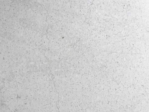 Beyaz ışıklı duvar kağıdında modern açık gri kireç taşı dokusu. Lüks gri beton masa üstü masa masası konsepti, pürüzsüz mermer..