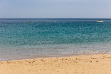 Fujairah plaj manzarasında nefes kesici bir gün batımı, uae. Yüksek kalite fotoğraf