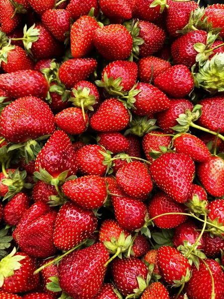 Arka plan olarak tatlı taze çilek dokusu, yakın plan. Yüksek kalite fotoğraf