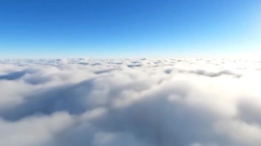 Bulutların üzerinde uçuşun güzel hava görüntüleri, yukarıdan manzaralı manzaralar, yumuşak bulut katmanları ve barışçıl bir gökyüzü atmosferi. Sinematik projeler, seyahat videoları, havacılık içeriği, arka plan veya rüya benzeri geçişler için ideal.
