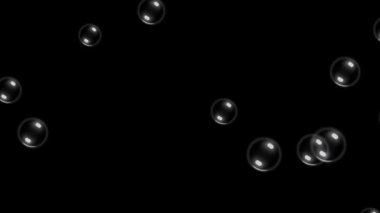Kristal berraklığında su kabarcıkları siyah bir zemine doğru yükseliyor. Sualtı sahneleri, içecek reklamları ve dekoratif video efektleri için mükemmel. Çok yönlü kullanım için kusursuz döngü.