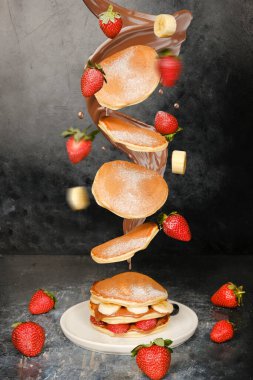 Fluffy Pancakes 'in Üzerinde Uçan İçindekiler