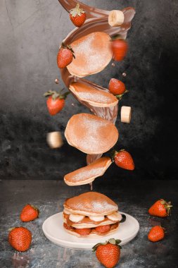 Fluffy Pancakes 'in Üzerinde Uçan İçindekiler