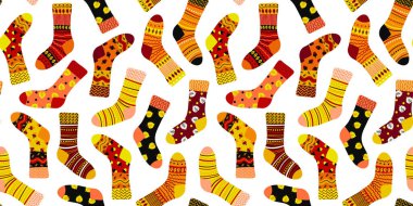Renkli desenli çoraplar. Sıcak kış giysileri ve tatil hediye paketi kağıdı için arka plan resimlerini tekrarla.