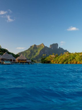 Over water bungalows in Bora Bora  clipart