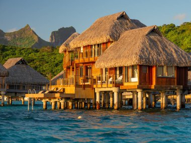 Over water bungalows in Bora Bora  clipart