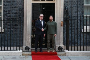 Britain's Prime Minister Keir Starmer greets Ukraine's President Volodymyr Zelenskyy at 10 Downing Street on July 19, 2024 in London, England. clipart