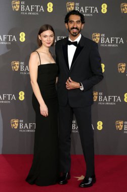Tilda Cobham ve Dev Patel, İngiltere 'nin başkenti Londra' da 16 Şubat 2025 tarihinde Royal Festival Hall 'da 2025 BAFTA film ödüllerine katıldılar..