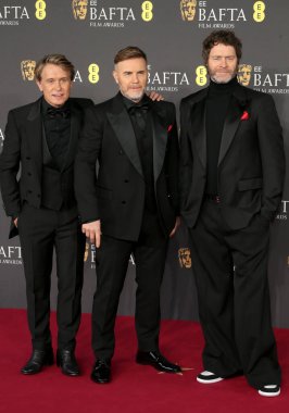 Take That 'ten Mark Owen, Gary Barlow ve Howard Donald, İngiltere' nin başkenti Londra 'da 16 Şubat 2025 tarihinde Royal Festival Hall' da 2025 BAFTA film ödüllerine katıldılar..