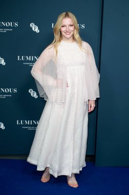 Morfydd Clark, 29 Eylül 2022 'de Londra, İngiltere' de Londra 'daki The Londoner Hotel' de düzenlenen BFI Londra Film Festivali 'ne katılır..