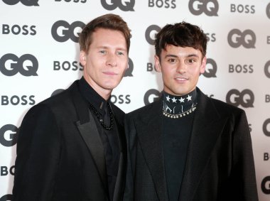 Lance Black ve Tom Daley, 16 Kasım 2022 'de İngiltere' de Yılın GQ Ödülleri 'ne katıldılar..
