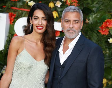 Amal Clooney ve George Clooney, İngiltere 'nin başkenti Londra' da bulunan Odeon Luxe Leicester Meydanı 'nda düzenlenen Dünya Cennete Yolculuk programına katıldılar..