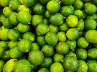 Arka plan olarak olgun taze yeşil limes.