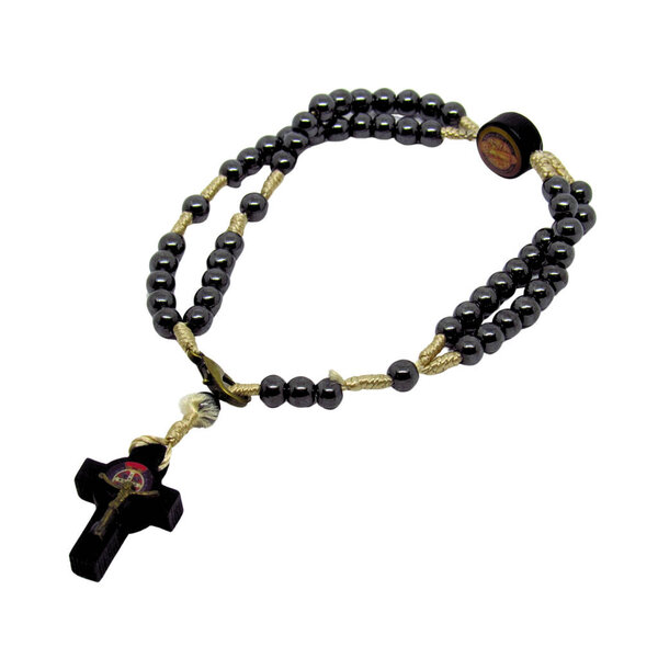 Rosary bracelet with black hematite beads, centerpiece and St. Benedict medal. Religious accessory used for protection and symbol of faith