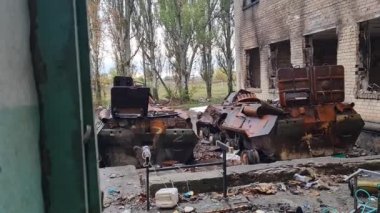 Kherson/ Ukraine 12. October 2022 Burned armored personnel carriers at the tertiary school