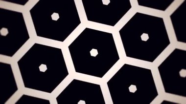 Büyüyen ve dönen eş merkezli kovan desenli siyah beyaz 4k optik sanat animasyonu. Kusursuz döngü.