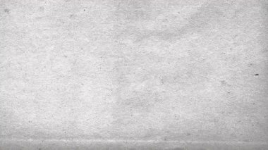 Grunge desenli eski bir kağıdın soyut beyaz arkaplan animasyonu. 4K kusursuz döngü. Slayt gösterisi. Düşük çerçeve hızı etkisi.