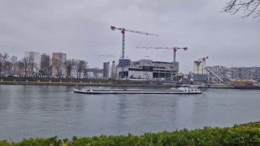 Barge cargo boat move on the Seine river, Asnieres, Paris, France