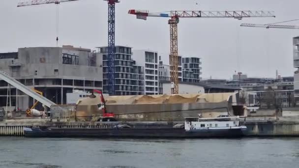 Busy Building Site Seine River Cranes Working Excavator Unloads Construction — Video