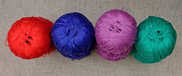 multi-colored skeins of thread. needlework threads, close-up