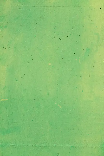 Lekeli ve çizikli eski yeşil kağıt dokusu