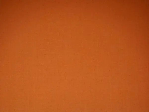 turuncu bir kumaşın arkaplanı.