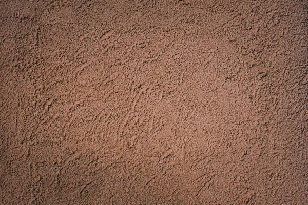 Sıvalı, desenli eski kırmızı duvar.