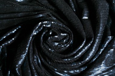 Arka plan dokusu, desen. Mavi ve siyah kumaş kovaları ya da Sequins. Moda kumaşı tasarımcılar veya hobi dikiş için kullanılmaya hazır. Etkinlikler, kutlamalar ve Noel için ideal